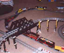 Elevated truss bridge allows multi-level play.